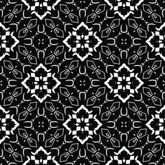  Geometric vector pattern with triangular elements. Seamless abstract ornament for wallpapers and backgrounds. Black and white colors.