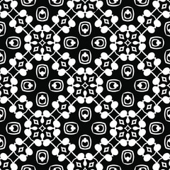  Geometric vector pattern with triangular elements. Seamless abstract ornament for wallpapers and backgrounds. Black and white colors.