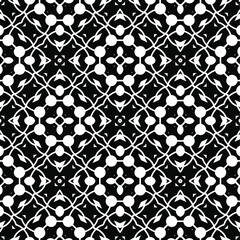  Geometric vector pattern with triangular elements. Seamless abstract ornament for wallpapers and backgrounds. Black and white colors.