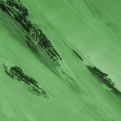 Green ink and watercolor texture on white paper background. Gradient paint strokes and decalcomania effect. Hand-painted gouache abstract image. Mess on the canvas.