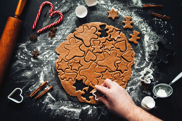 Cooking homemade gingerbread cookies. Traditional homemade Christmas pastries.