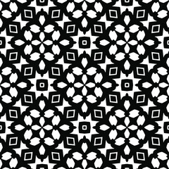 Geometric vector pattern with triangular elements. Seamless abstract ornament for wallpapers and backgrounds. Black and white colors.