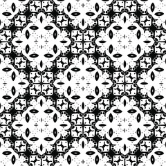  Geometric vector pattern with triangular elements. Seamless abstract ornament for wallpapers and backgrounds. Black and white colors.
