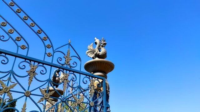 Kazan, Russia. Decor in form of the dragon Zilant at the wrought-iron gates of the Millennium Park.