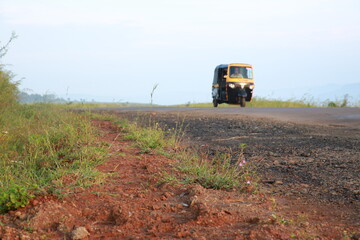 auto rickshaw on road  