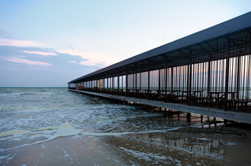 Side view of the empty simple covered pier of Koblevo in Ukraine