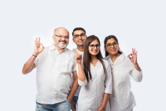 Closeup portrait of Asian Indian family with trendy eye glasses