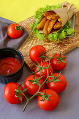 fried homemade potatoes and tomato ketchup