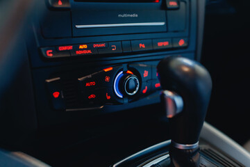 Climate control panel with buttons on the modern car.
