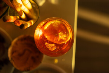 glass of orange aperol spritz 