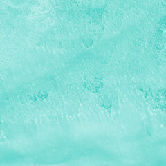 Aqua ink and watercolor texture on white paper background. Paint leaks and decalcomania effects. Hand-painted gouache abstract image. Mess on the canvas.