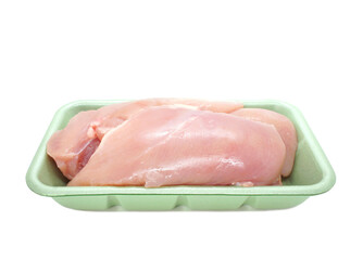 Raw chicken fillets in polystyrene container isolated on white background. Uncooked chicken breast...
