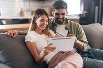 Couple enjoying online shopping