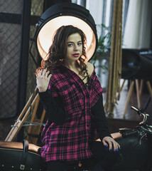 Obraz na płótnie Canvas Beautiful motorcycle fashion woman