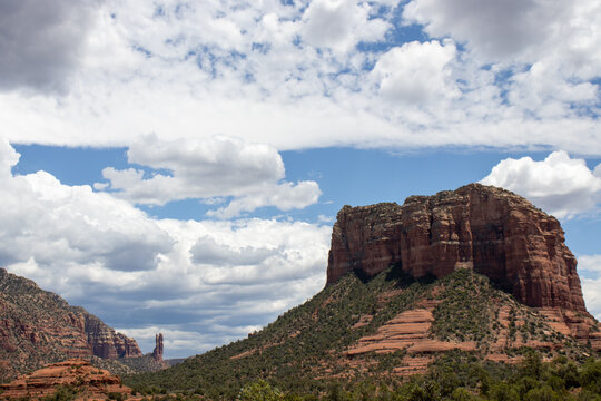 Bell Rock is a landmark that has greeted the people coming into the Sedona Valley for eons and with the summer storms brewing in the background, makes it all that more impressive.  - Powered by Adobe
