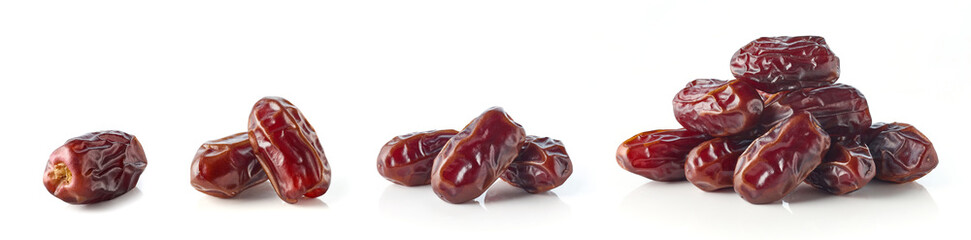 Heap of dates isolated on white