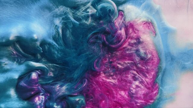 Paint splash. Color explosion in water. Nebula cloud. Glowing fume animation. Contrast blue magenta pink purple glitter mist dynamic texture creative abstract background.