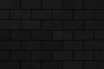 Black cement block fence texture and seamless background