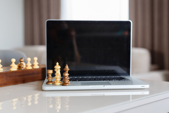 play chess online with tablet computer. Online education, remote distance learning, entertainment at home