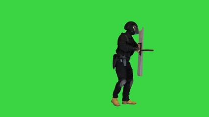 Riot police officer hitting his riot shield while moving forward with the shield up on a Green Screen, Chroma Key.