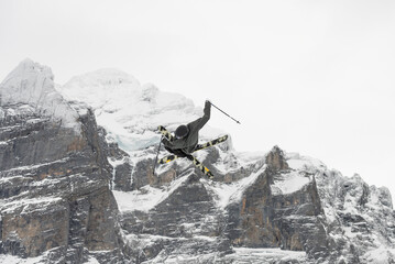 Snowboard ski freestyle big air contest in the background Mittelhorn mountain. Snowboard tricks,...