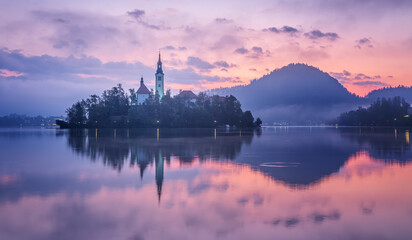 Naklejka premium Bled Lake, island with Pilgrimage Church, Slovenia.
