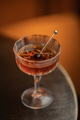 aperitif cocktail with decorations, boy with drink