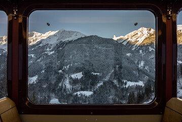 Wengernalp Railway in winter . Train to wengen in jungfrau region in the canton of Bern in  Swiss Switzerland
