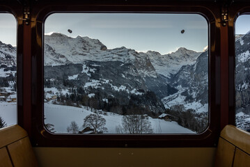 Wengernalp Railway in winter . Train to wengen in jungfrau region in the canton of Bern in  Swiss Switzerland