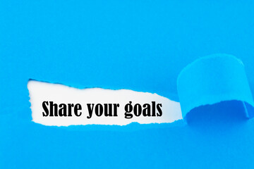 Share your goals message written under torn paper.