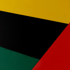 February Black History Month. Abstract Paper geometric black, red, yellow, green background. Copy space, place for your text.