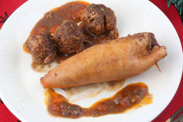 stuffed squid cooked with sauce and meat balls