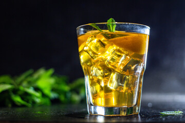 alcoholic beverage cocktail drink ice cube lemon and mint portion on the table meal outdoor top view copy space for text food background rustic image