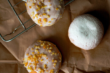 Close up on traditional polish donuts, served on Fat Thursday, selective focus, top view