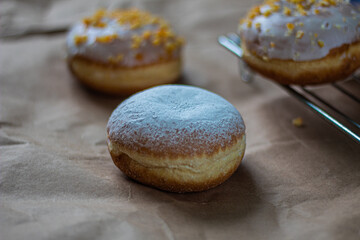 Close up on traditional polish donuts, served on Fat Thursday, selective focus