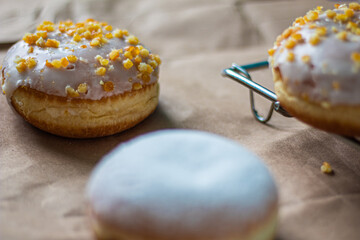 Close up on traditional polish donuts, served on Fat Thursday, selective focus