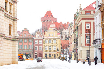 Royal Castle and Old Market square in Old Town of Poznan in the snowy winter day, Poznan, Poland