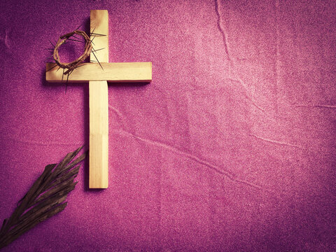 Lent Season,Holy Week and Good Friday concepts - wooden cross image in vintage background. Stock photo.
