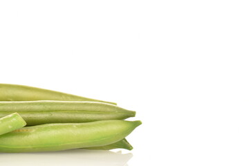 Pod of bright green, organic, natural, ripe beans on a white background.