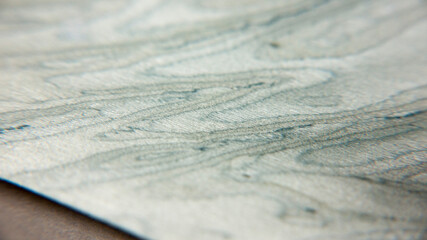 Papel marmolado azul y gris