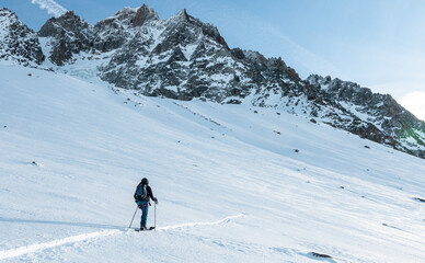 Fototapeta na wymiar Snowboard freeride ascent at the Chardonnet Peak, Chamonix, France