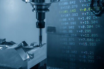 Abstract scene of CNC milling machine and G-code data background. The hi-technology mold and die...