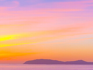 Sun sets over the island