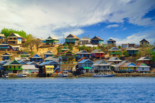 Multi coloured houses by the ocean, Bajo pulau island, Bima, West Nusa Tenggara, Indonesia