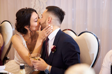 bride and groom kissing