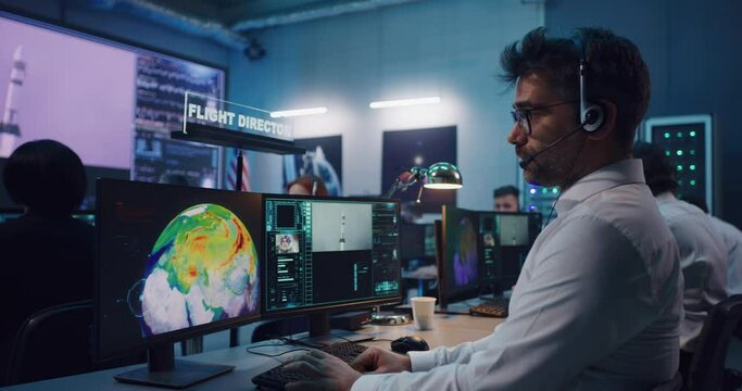 Man controlling launch of rocket