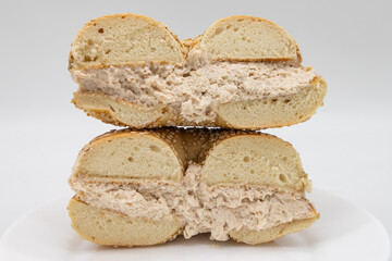 New York City Sesame Seed Bagel Cut in Half with Apple Cinnamon Cream Cheese