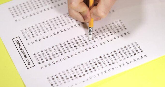 exam test. Filling in the test. Erase the wrong answer on the test form