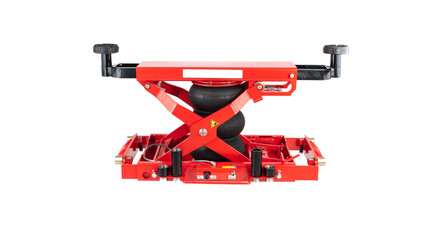 Red car traverse for repair and lifting of equipment in working form on a white background, isolation