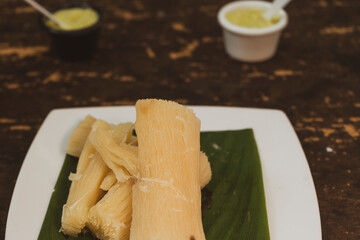 Fried yucca with guacamole sauce 